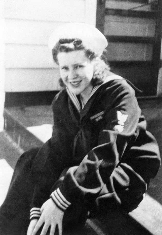 1945-00-00-AMS-sitting-in-Uncle-Harold's-wearing-her-uncle-Clay-Lincoln's-WWII-US-Coast-Guard-service-uniform-Roll-650L_r2026-NixFineArt.jpg