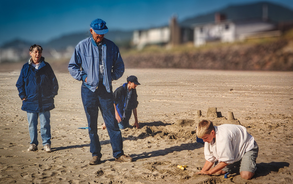 1999-08-00-1-Rockaway,-Oregon-Angie---Dad-watch-Zach---Conrad-build-castles-in-the-sand.jpg