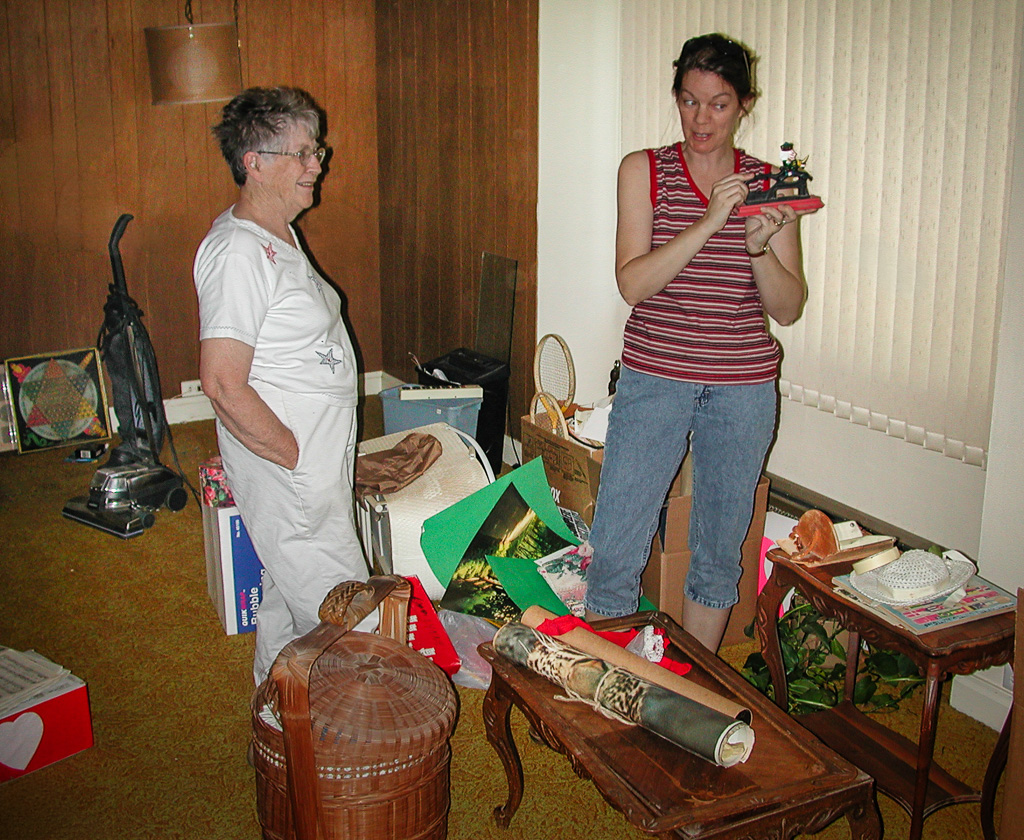 2004-08-03-DSCN_535-Lynn---Angie-discuss-a-cast-iron-soldier-nutcracker.jpg