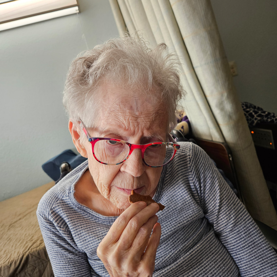 2025-02-02-Angie-savors-the-last-of-Catherine's-Chirstmas-cookies.jpg
